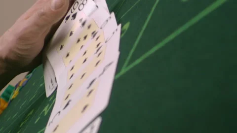 Shuffle Card on the green table Stock Footage 219642994