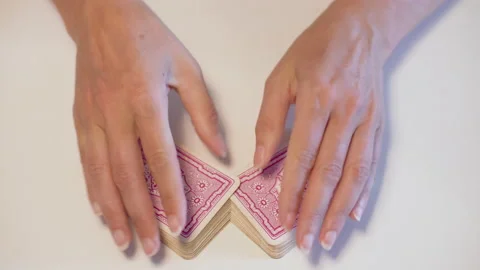 Shuffle cards with two hands to play a game Stock Footage 153667251