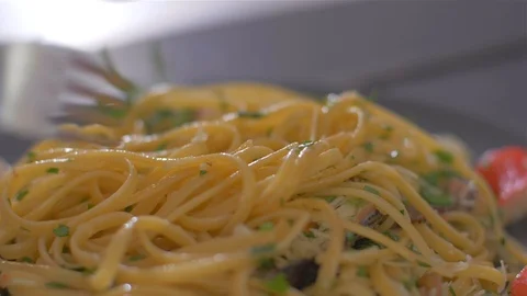 Shuffle a very delicious paste with seafood and mussels. Stock Footage 111670119