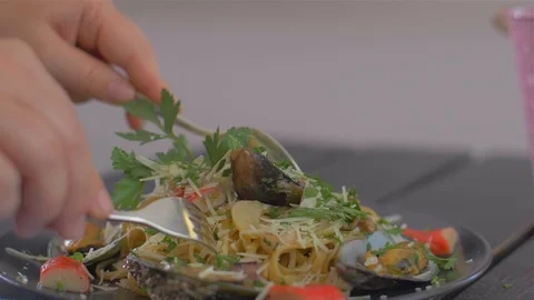 Shuffle a very delicious paste with seafood and mussels. Stock Footage 111670805
