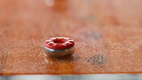 Shuffleboard pucks in a shuffleboard game Video stock 305944980