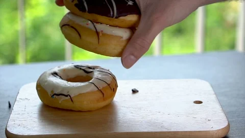 Shuffling Around Donuts Like Poker Chips Stock Footage 105782962