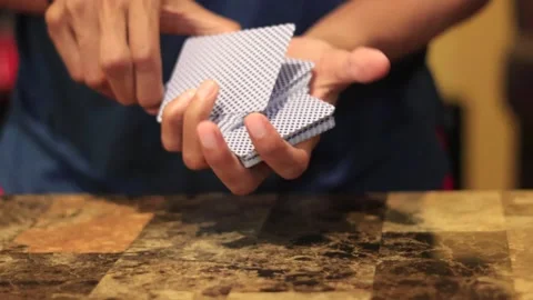 Shuffling cards for a poker game. Stock Footage 338189363