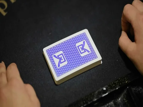 Shuffling playing cards - new deck ruffle and shuffle cut Stock Footage 74229148