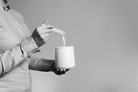 Shugaring paste stretched with spatula black and white Stock Photos