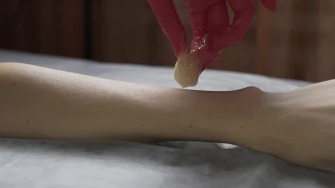 Shugaring procedure on skin Stock Footage 124498672