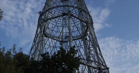 Shuhov tower under running clouds on vertical track clouds timelapse Stock Footage 140888338