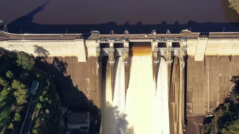 Shut dam gate on Warragamba river in Blue Mountains of Sydney aerial 4k. Stock Footage 174943589