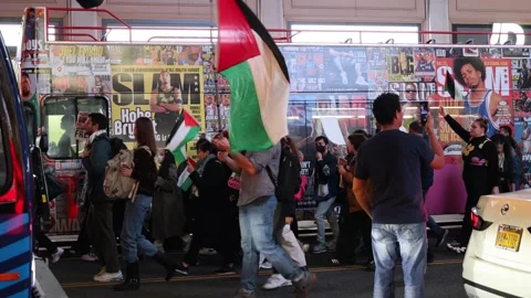 Shut It Down for Palestine march across 42nd St in Manhattan, on 11/9/2023 Stock Footage 255338300