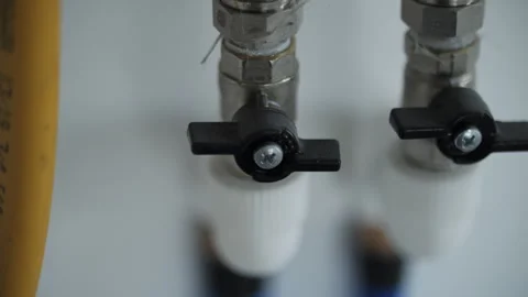 Shut off valves on heating system pipes Stock Footage 311461892