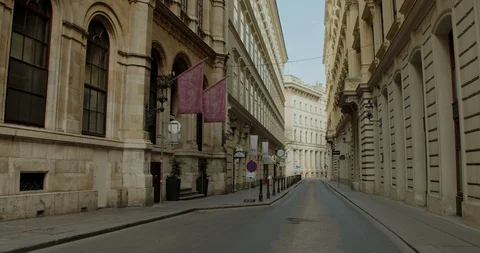 Shutdown in Vienna, Austria - tracking shot of empty street in the inner city Vídeo Stock 128699896