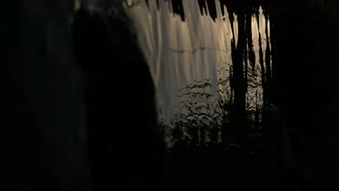 Shutter lake rocks vertical slomo Stock Footage 205550840