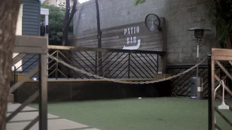 A shuttered patio bar Stock Footage 130547295