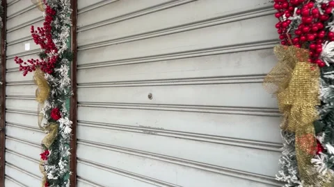 Shutters covered by Christmas decorations Stock Footage 232042997