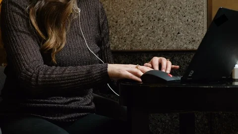 Shutting down the computer and placing in womans bag Stock Footage 107944647