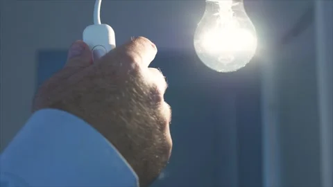Shutting the Light from the Switch in the Office. One Person Turning Off the Stock Footage 321244005