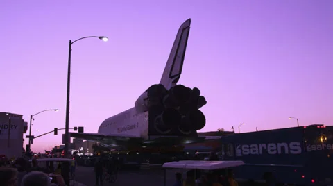 Shuttle Endeavor rolls through the streets of Los Angeles 4K Video stock 39567547