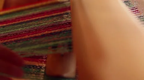 Shuttle passing back and forth in a loom Stock Footage 48719237