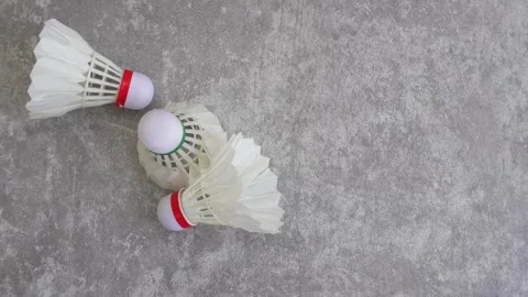 Shuttlecock on abstract gray background Video stock 336907018