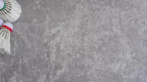 Shuttlecock on abstract gray background Video stock 336907021