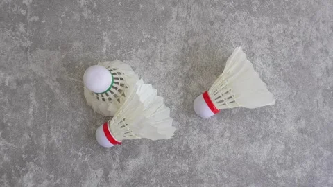 Shuttlecock on abstract gray background Video stock 336907022