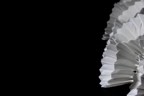 Shuttlecock on a black background. Stock Photos