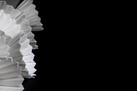 Shuttlecock on a black background. Stock Photos