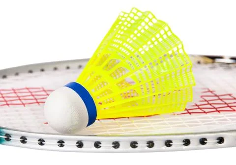Shuttlecock lying on the badminton racket Stock Photos