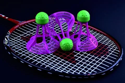 Shuttlecocks and racket Stock Photos