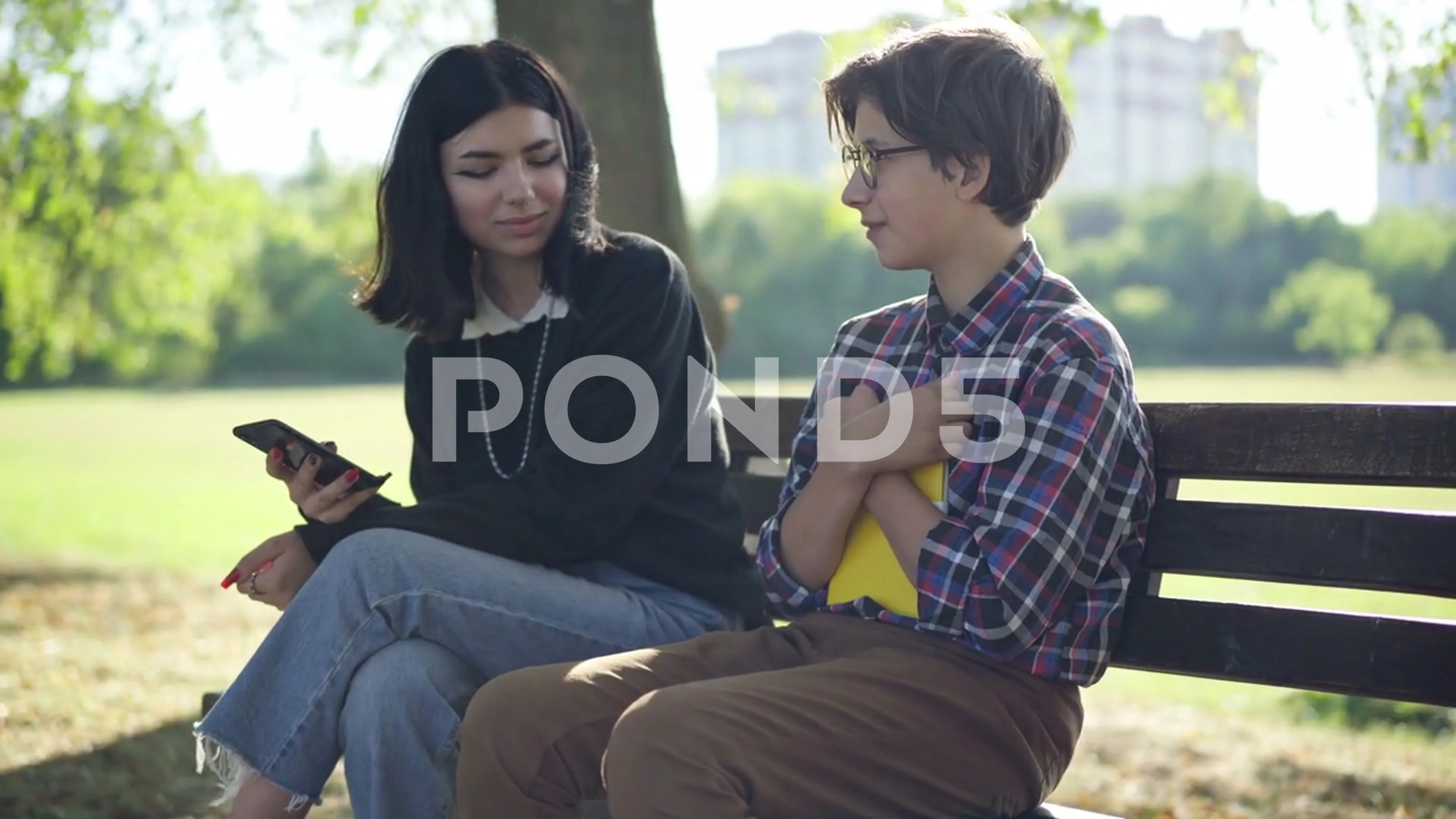 Shy nerd teenage boy talking to girl ignoring classmate and leaving with