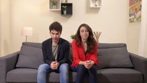 Shy young lovers at first date.Man giving a kiss on woman's cheek Stock Footage 111564967