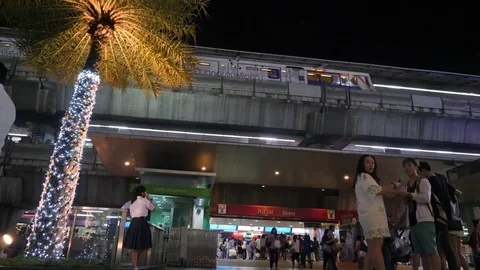 Siam BTS Subway Train Station 4K Timelapse. Asian Thai People and Tourists Video stock 82338114