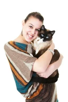 Siamese cat and owner Foto stock