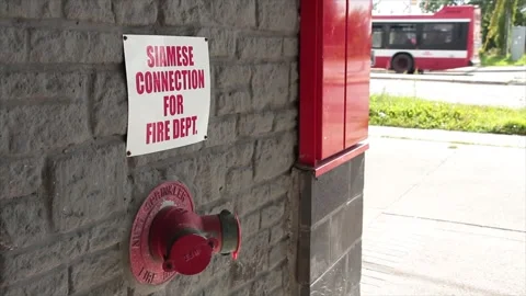 Siamese connection for fire dept department writing caption text square white Stock Footage 250280894