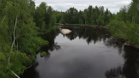 Siberian river between the forest and small sand islands Stock Footage 302109683
