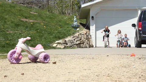 Sibling Bicycle Race Video stock 130757833