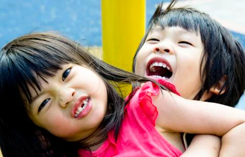 Sibling playing Stock Photos