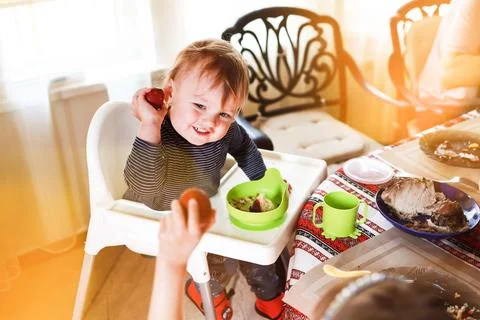 Siblings doing easter egg knocking Stock Photos