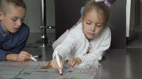Siblings drawing and coloring Stock Footage 100174458