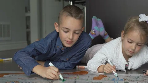 Siblings drawing and coloring Stock Footage 100174479