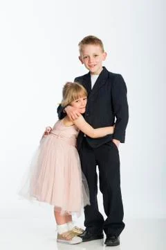 Siblings sharing a cuddle Stock Photos