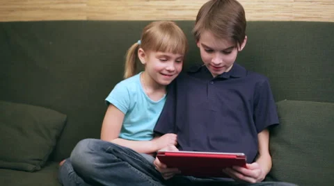 Siblings using a tablet computer Stock Footage 48718920