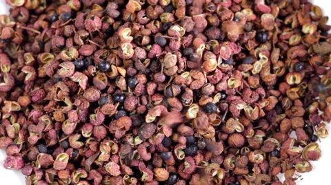 Sichuan peppercorns falling Stock Footage 62395705