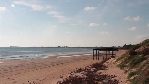 Sicily italy beach sand with bright sun shining wide shot with clouds sky empty Stock-Footage 252152292