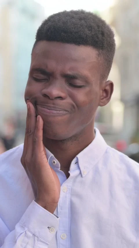 Sick African Man having Toothache while Standing Outdoor, Vertical Video 库存影片 340024062