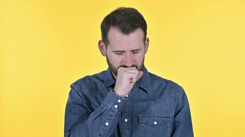Sick Beard Young Man Coughing , Yellow Background Stock Footage 122414622