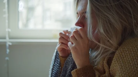 Sick beautiful young woman coughing sneeze allergy into tissue feel very bad Stock Footage 127195928