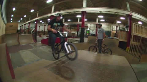 Sick bmx riders does a big 360 jump Stock Footage 51702198