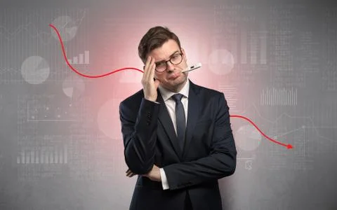 Sick businessman with decreasing performance concept Stock Photos
