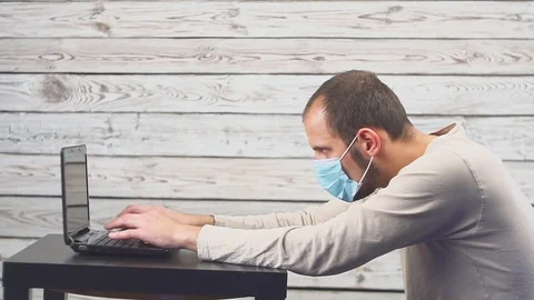 Sick businessman use laptop computer with temperature and headache working in 스톡 동영상 98313751
